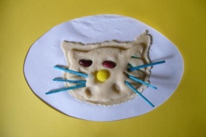 MIAUCZY KOTEK